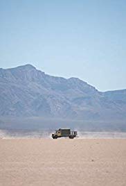 truck driving through desert